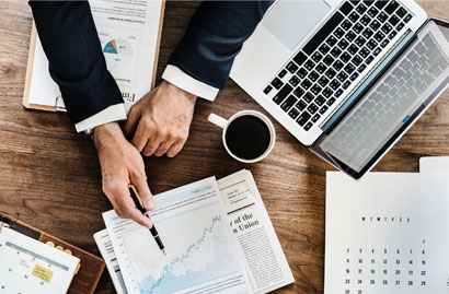A man Analyzing financial reports